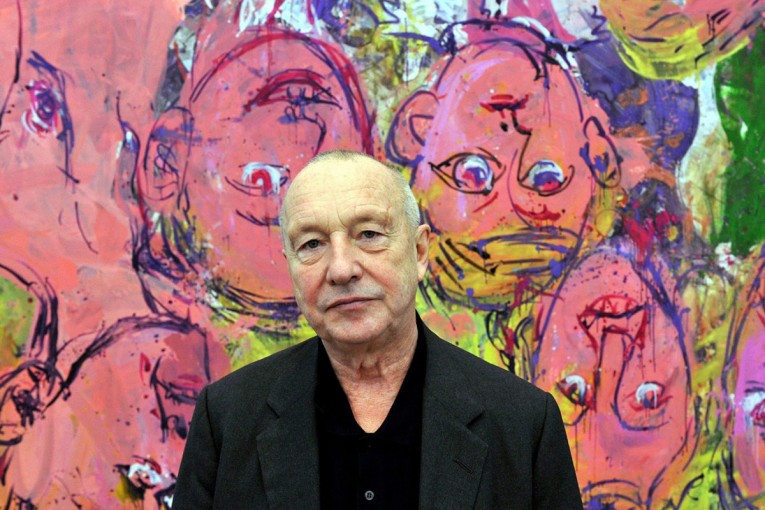 epa01939572 A picture made available on 20 November 2009 shows artist Georg Baselitz posing in front of the painting 'Us At Home' at the Museum Frieder Burda in Baden-Baden, Germany, 17 November 2009. 'Baselitz. A Retrospective' running from 21 November 2009 to 14 March 2010 at the Museum Frieder Burda, features a comprehensive insight into the work of Georg Baselitz. EPA/ROLF HAID